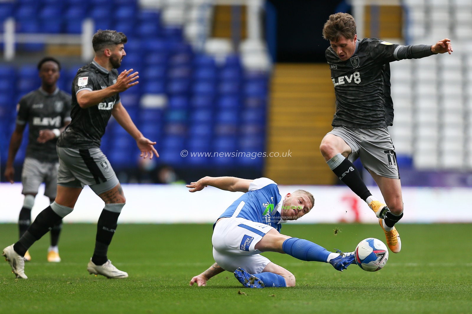Adam Clayton (8) of Birmingham City tackles Adam Reach (11) of Sheffield Wednesday