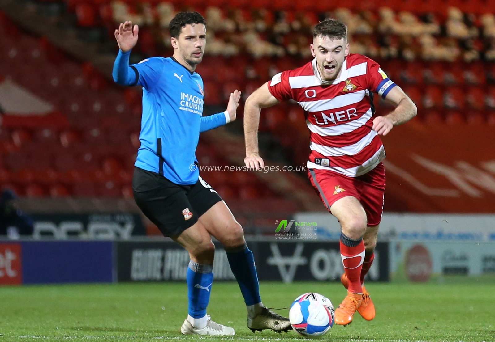 Ben Whiteman #8 of Doncaster Rovers in action during the game