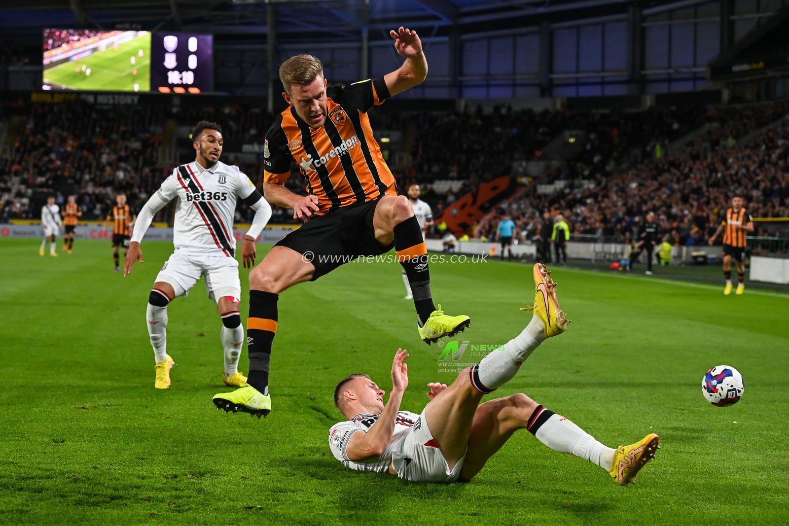 Callum Elder #3 of Hull City is tackled by Ben Wilmot #16 of Stoke City during the Sky Bet Championship match Hull City vs Stoke City at MKM Stadium, Hull, United Kingdom, 13th September 2022

(Photo by Craig Thomas/News Images)