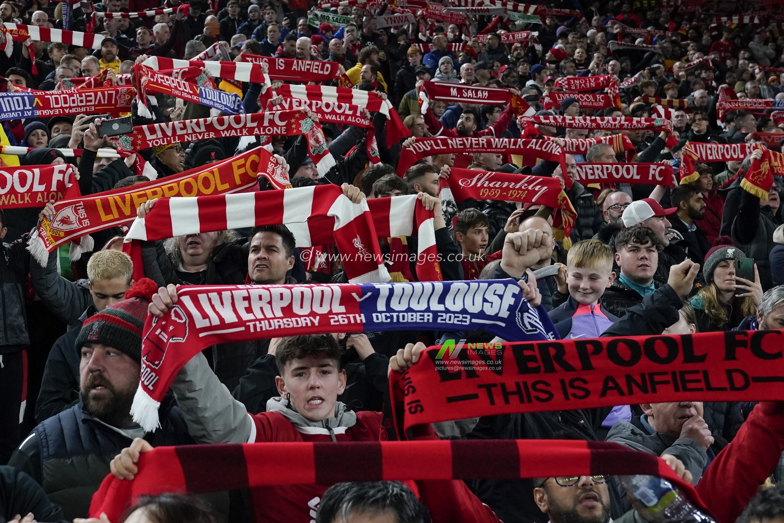 Liverpool fans raise their scarves before the UEFA Europa League match Liverpool vs Toulouse at Anfield, Liverpool, United Kingdom, 26th October 2023

(Photo by Steve Flynn/News Images)