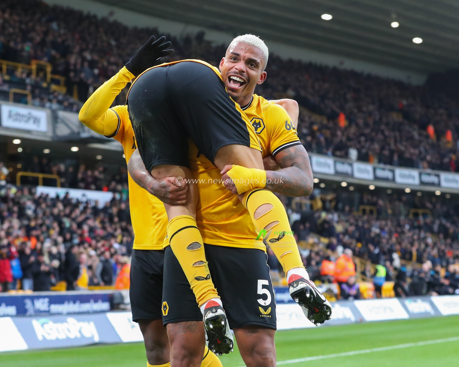 Mario Lemina of Wolverhampton Wanderers celebrates NÃ©lson Semedo of Wolverhampton Wanderers goal to make it 2-0 Wolverhampton Wanderers, during the Premier League match Wolverhampton Wanderers vs Fulham at Molineux, Wolverhampton, United Kingdom, 9th March 2024

(Photo by Gareth Evans/News Images)
