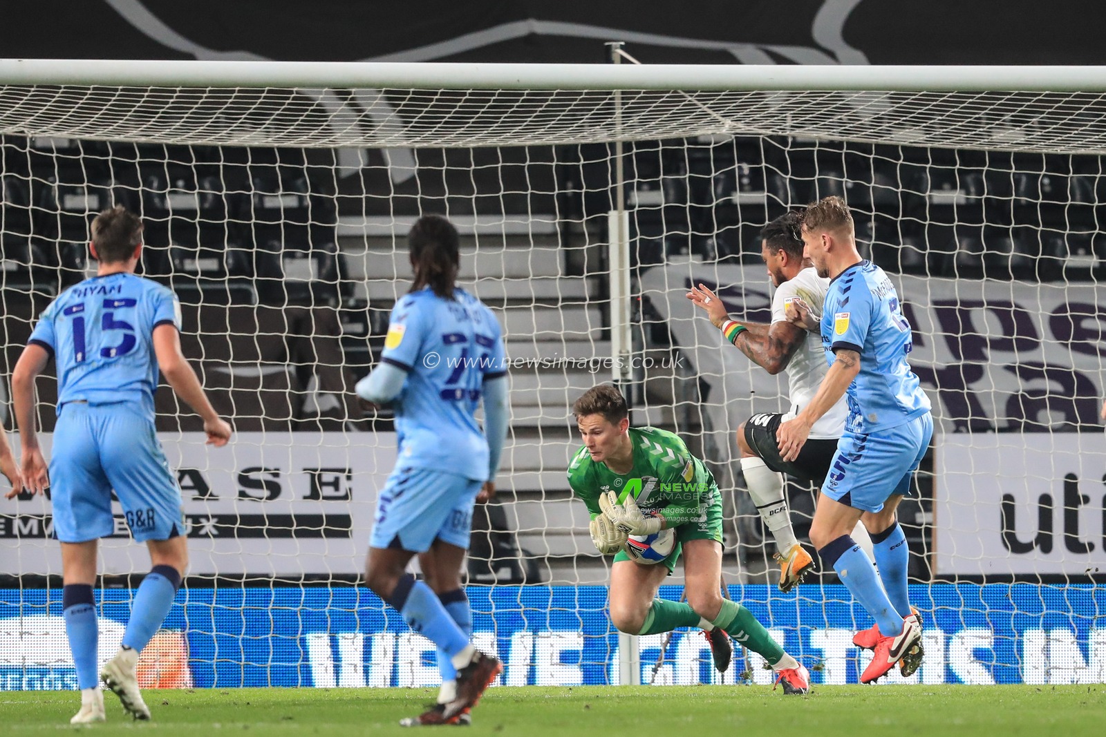 Ben Wilson #13 of Coventry City makes a save