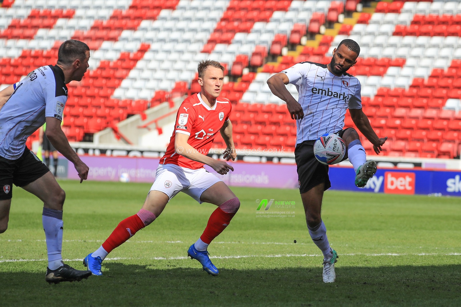 Michael Ihiekwe #20 of Rotherham United clears the ball