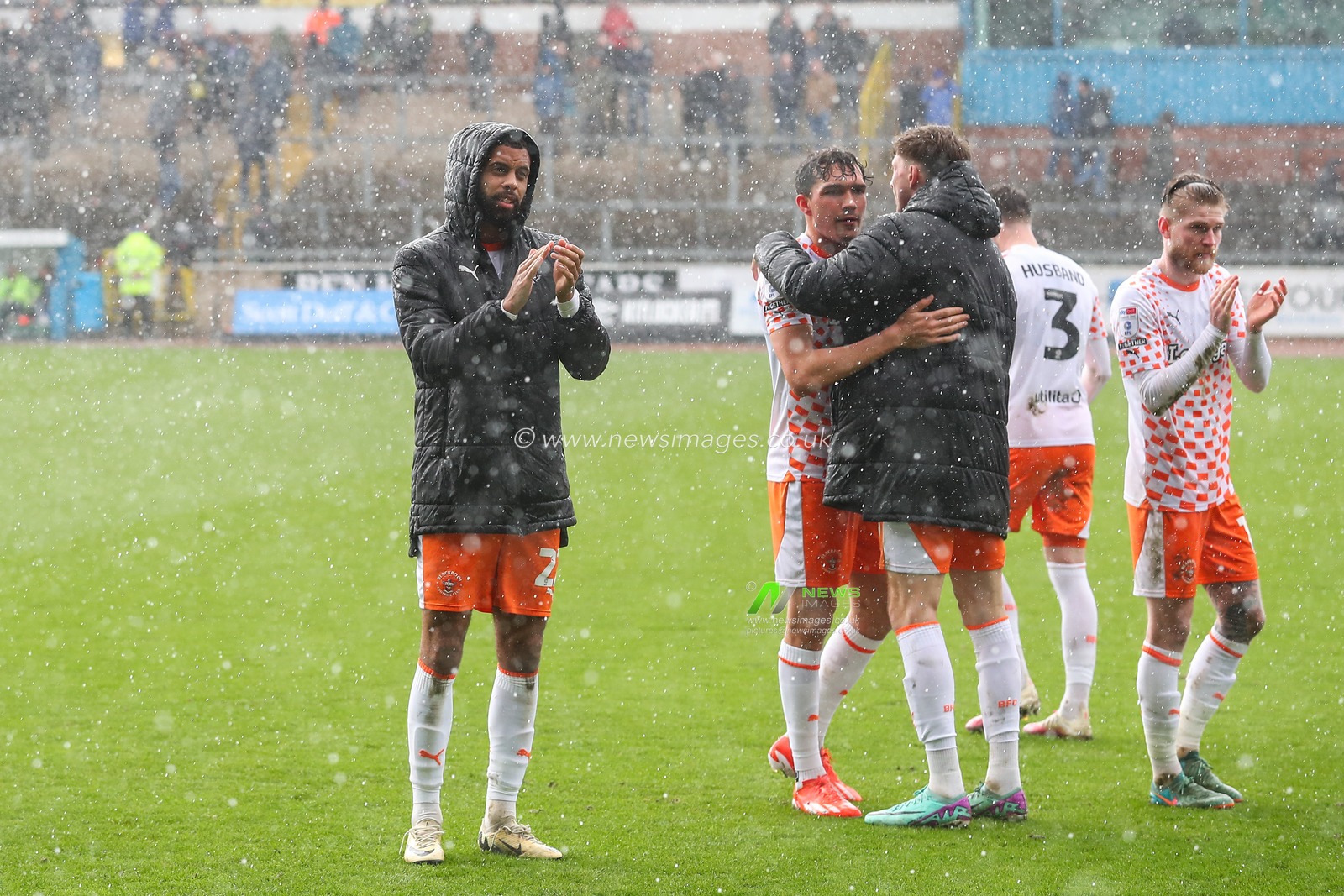 CJ Hamilton of Blackpool applauds the travelling fans after the Sky Bet League 1 match Carlisle United vs Blackpool at Brunton Park, Carlisle, United Kingdom, 13th April 2024

(Photo by Gareth Evans/News Images)