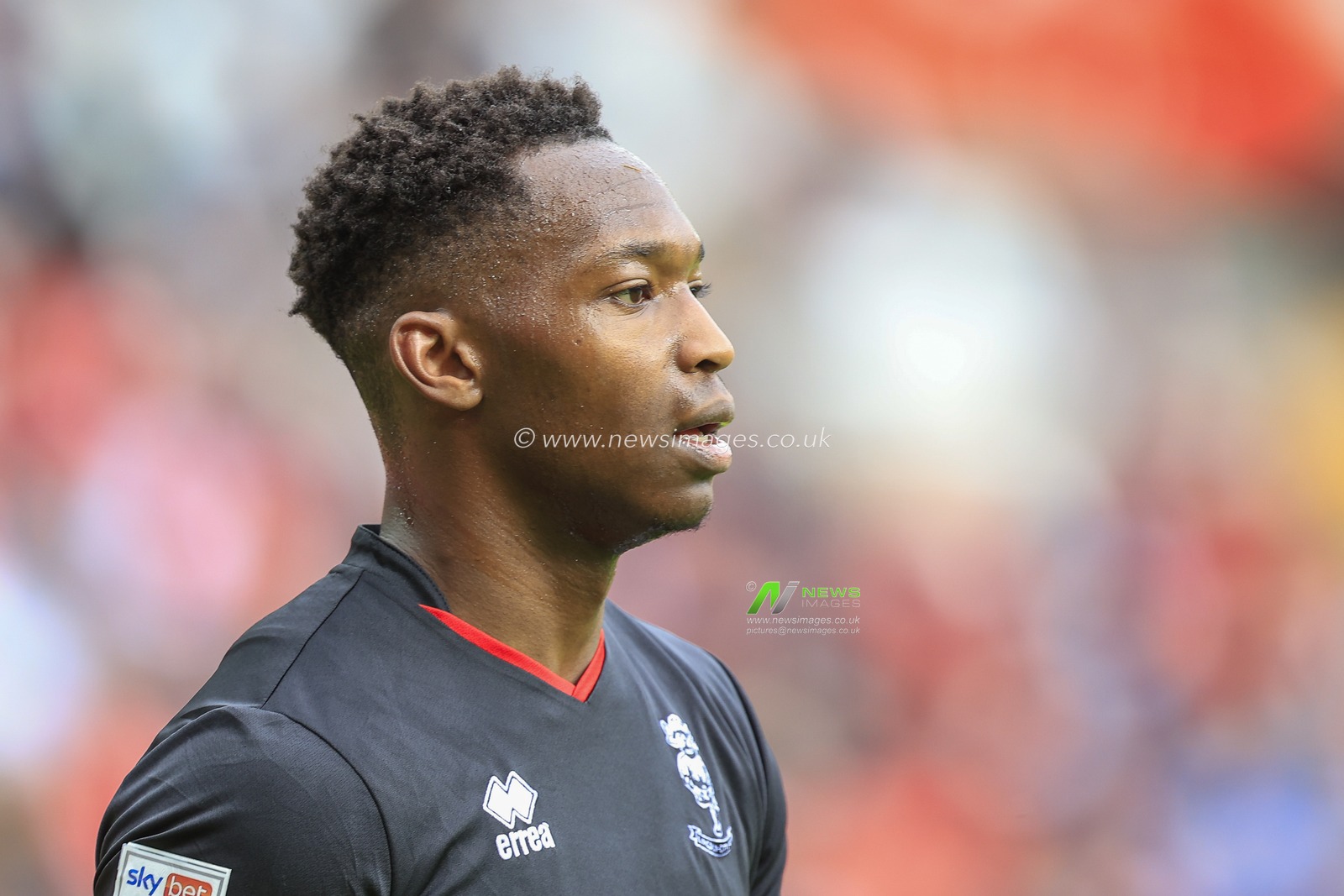 Tayo Edun #7 of Lincoln City during the game
