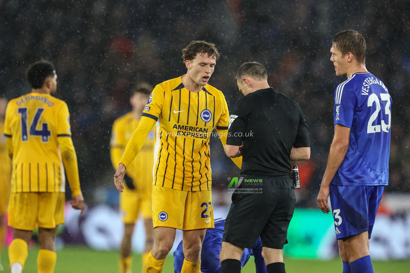 Mats Wieffer of Brighton & Hove Albion appeals to referee Stuart Attwell for his yellow card during the Premier League match Leicester City vs Brighton and Hove Albion at King Power Stadium, Leicester, United Kingdom, 8th December 2024

(Photo by Alfie Cosgrove/News Images)