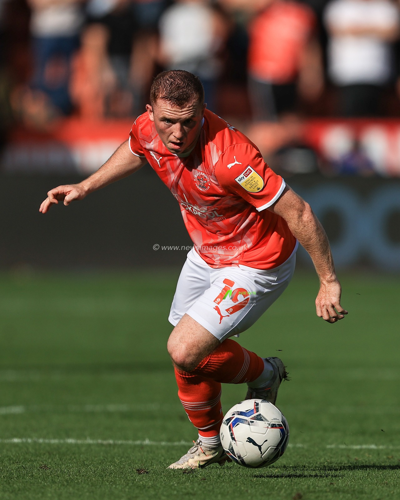 Shayne Lavery #19 of Blackpool in action during the game