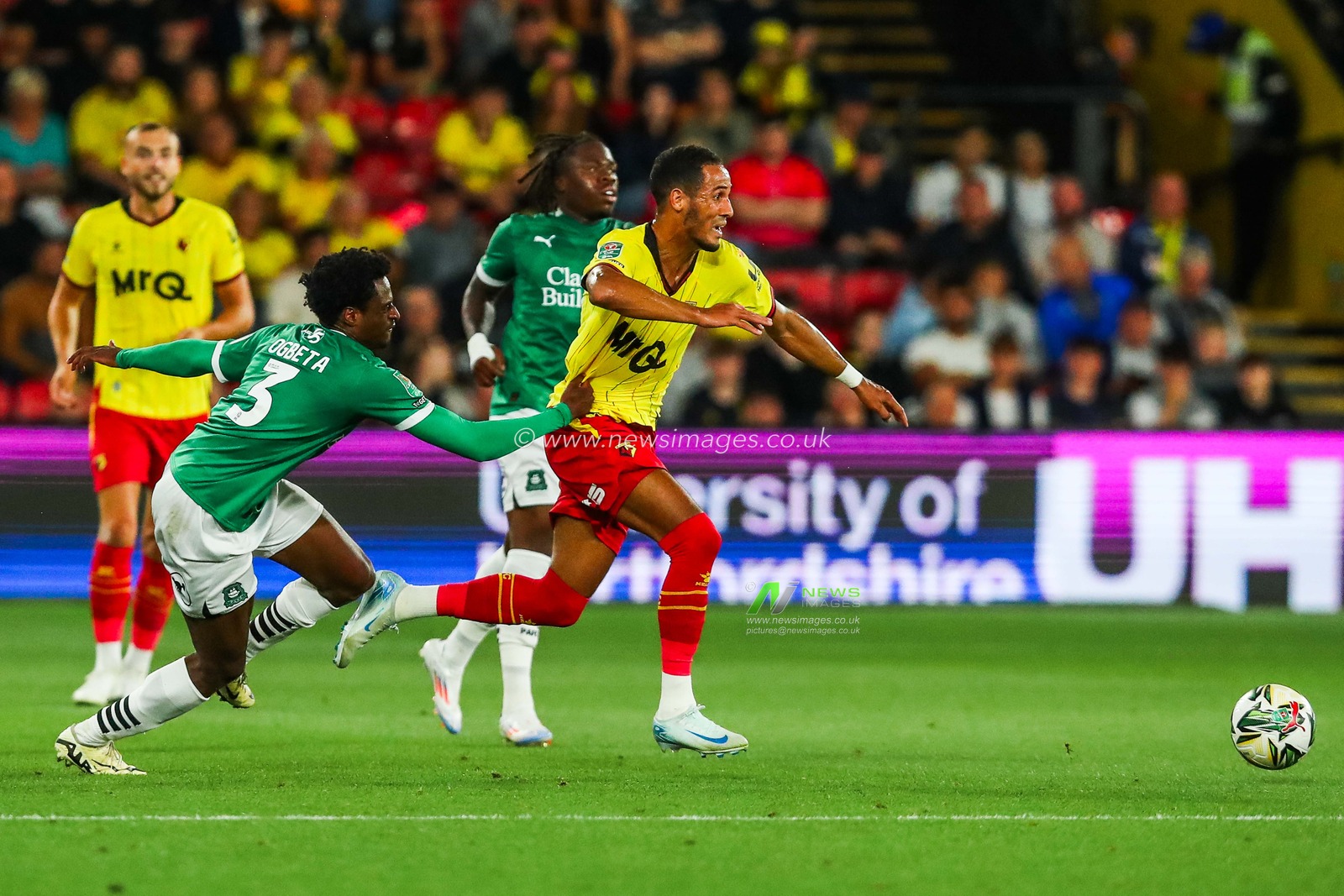 Tom Ince of Watford is put under pressure byNathanael Ogbeta of Plymouth Argyle during the Carabao Cup match Watford vs Plymouth Argyle at Vicarage Road, Watford, United Kingdom, 27th August 2024

(Photo by Izzy Poles/News Images)
