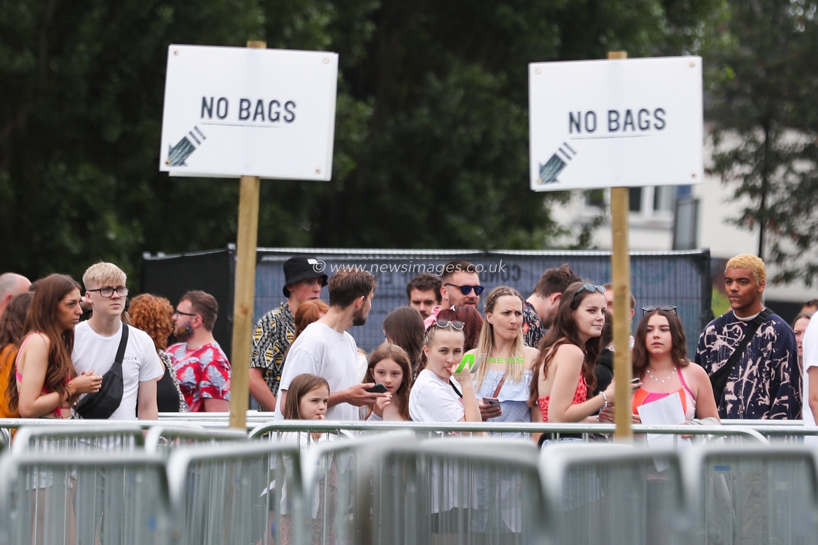 Festival goers arrive during Day One of Tramlines Festival