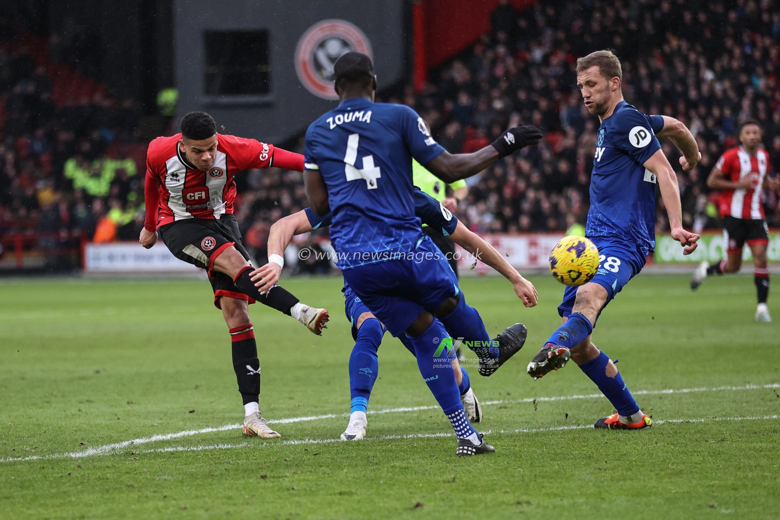 George Baldock of Sheffield United shoots on goal forcing the keeper to push it out for a corner during the Premier League match Sheffield United vs West Ham United at Bramall Lane, Sheffield, United Kingdom, 21st January 2024

(Photo by Mark Cosgrove/News Images)