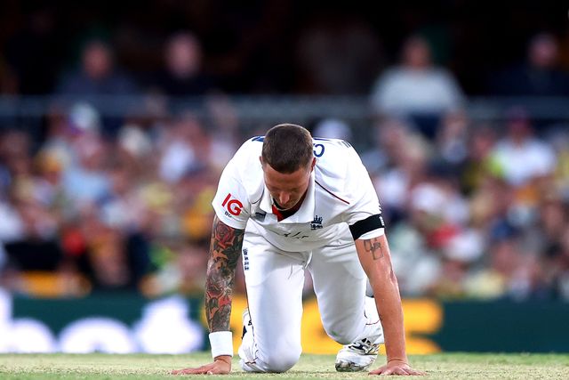 Brydon Carse of England  stumbles during the NRMA Insurance Ashes Second Test Day 2 Australia vs England at The Gabba, Brisbane Cricket Ground, Brisbane, Australia, 5th December 2025

(Photo by Pat Hoelscher/News Images)

*** GER AUT SUI OUT ***