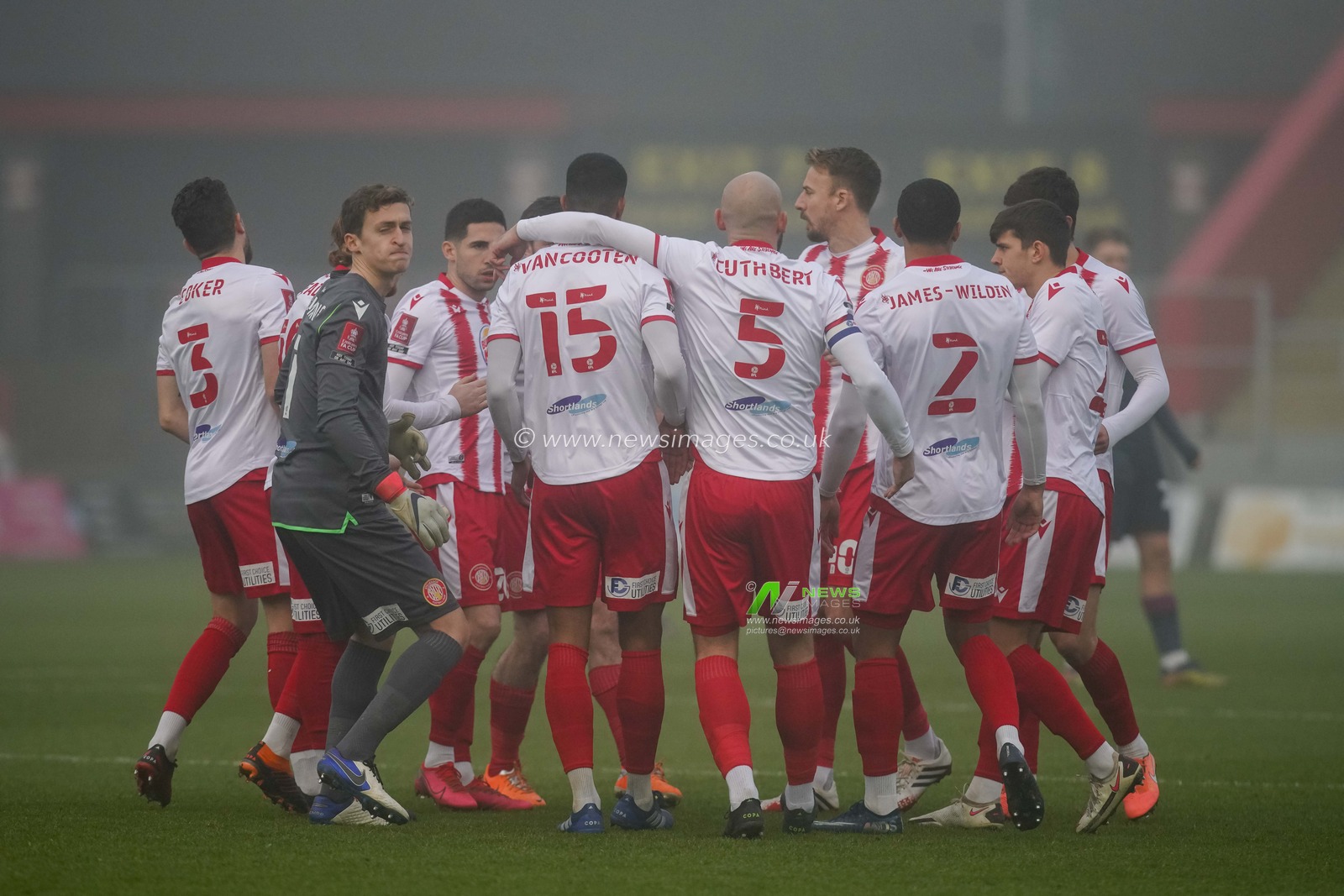 Stevenage Team hug prior to the game