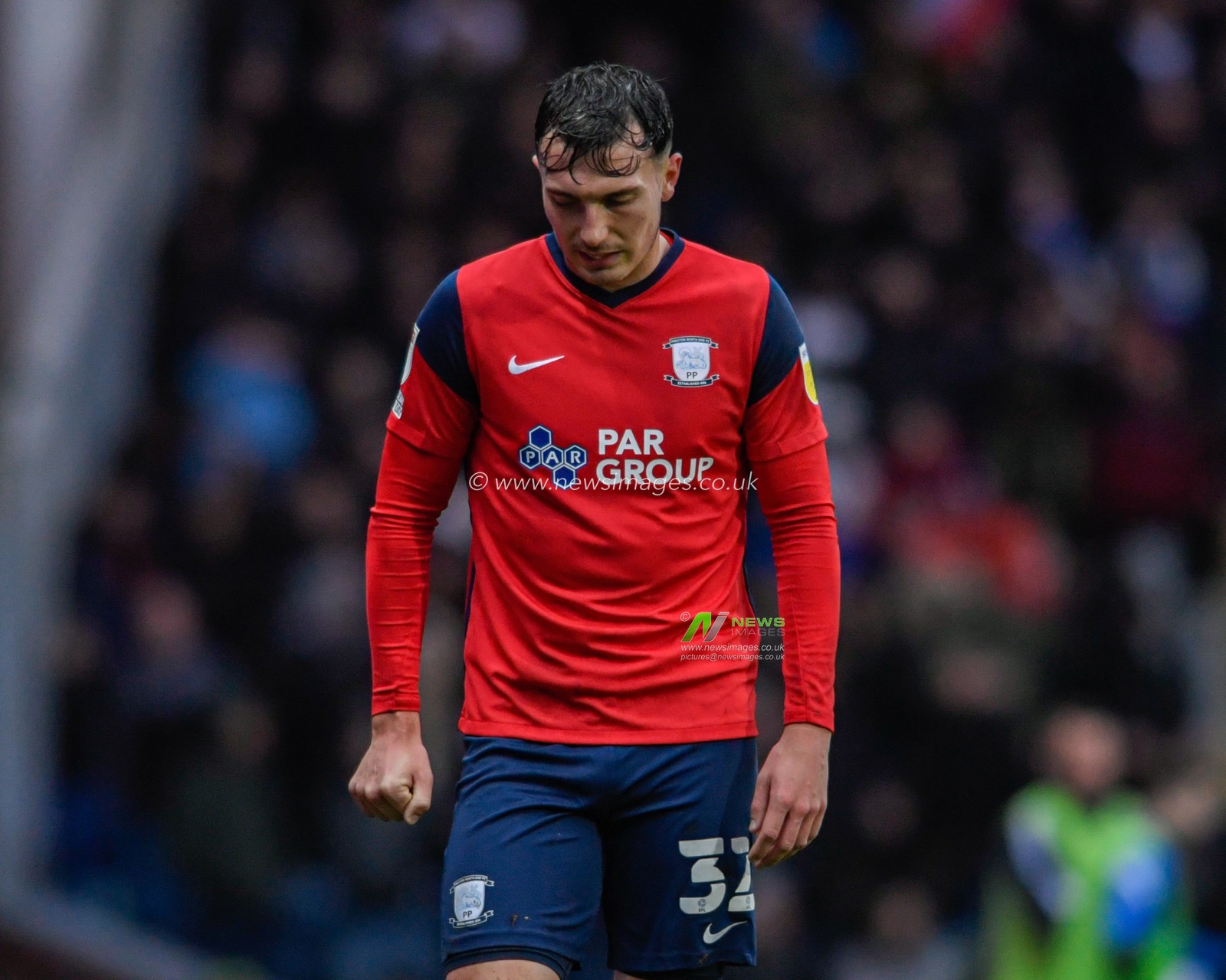 Josh Earl #32 of Preston North End looks down at the ground