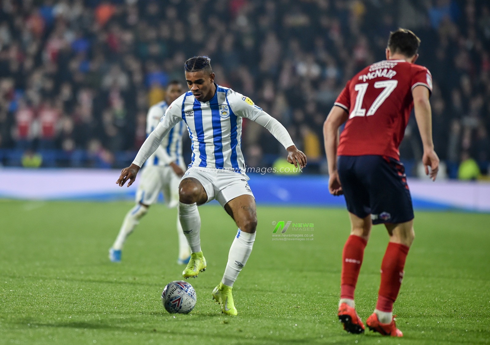 23rd October 2019, John Smith's Stadium, Huddersfield, England; Sky Bet Championship, Huddersfield Town v Middlesbrough : Juninho Bacuna (7) of Huddersfield Town invites the Middlesborough defence.

Credit: Dean Williams/News Images
