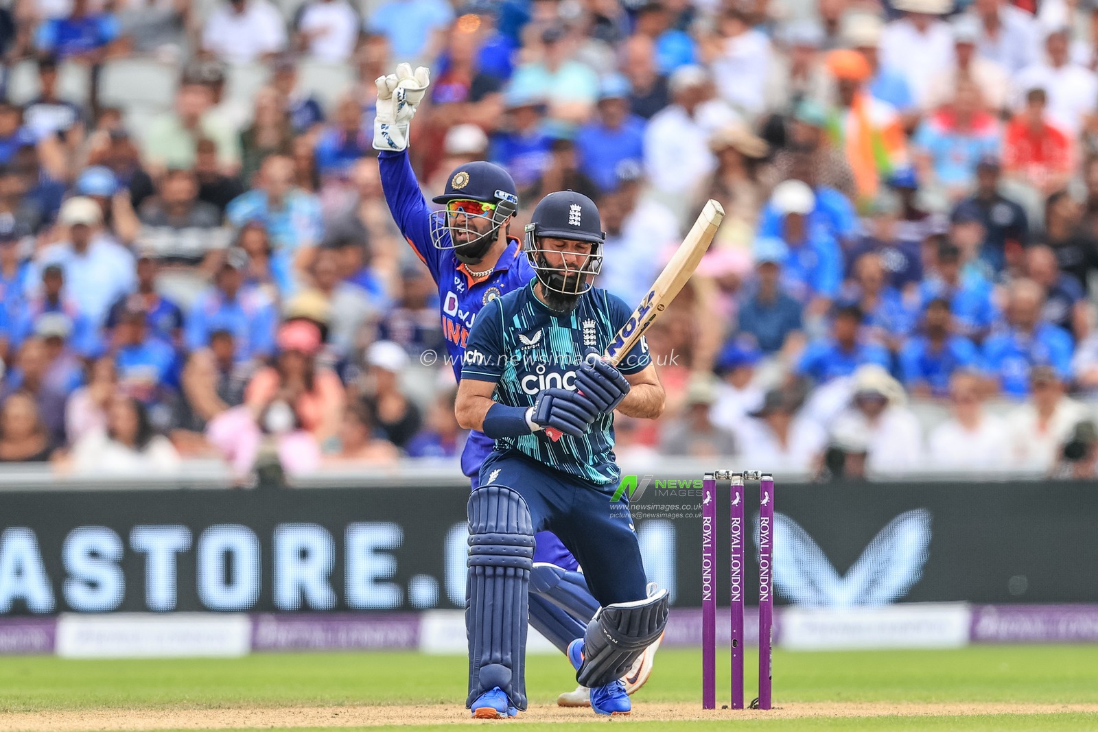 Rishabh Pant of India celebrates catching Moeen Ali of England