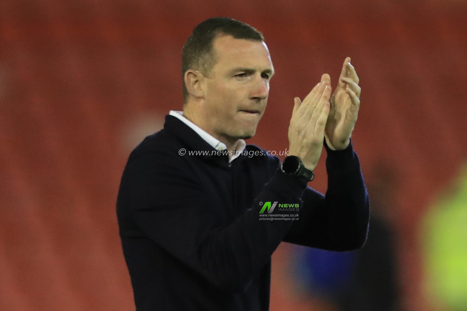 Neill Collins Head coach of Barnsley applauds the home fans after Barnsley win 3-1during the EFL Trophy match Barnsley vs Manchester City U21 at Oakwell, Barnsley, United Kingdom, 26th September 2023

(Photo by Alfie Cosgrove/News Images)