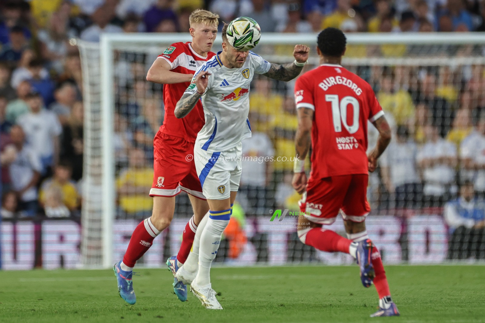 Joe Radon of Leeds United wins the header during the Carabao Cup match Leeds United vs Middlesbrough at Elland Road, Leeds, United Kingdom, 14th August 2024

(Photo by Mark Cosgrove/News Images)