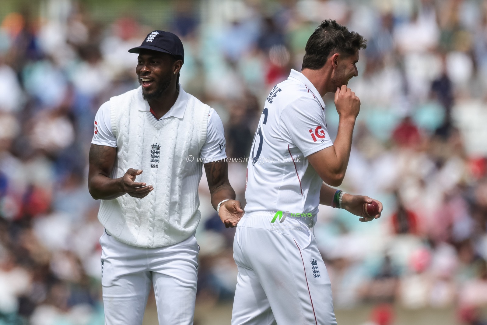 Jofra Archer of England reacts after he hits Josh Tongue of England with the ball as he passes it to him during the 2nd Rothesay Test Match Day 1 match England vs New Zealand at The Kia Oval, London, United Kingdom on 17 June 2026

(Photo by Mark Cosgrove/News Images)