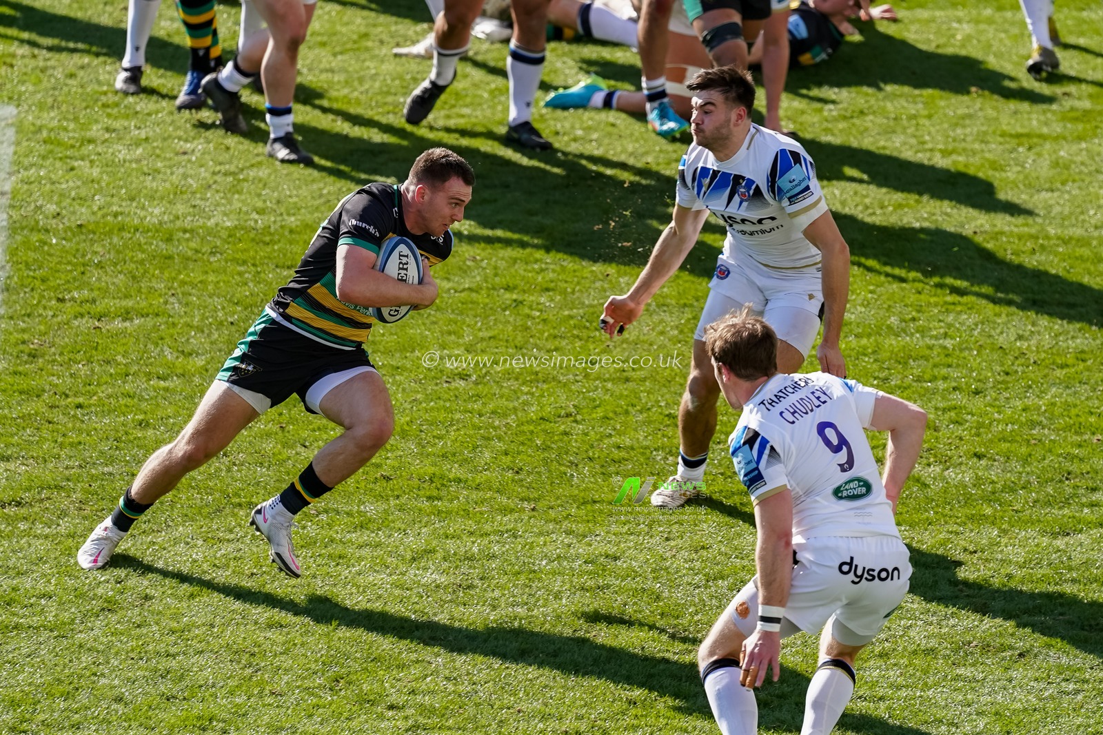 Tom James #9 of Northampton Saints scores the opening try