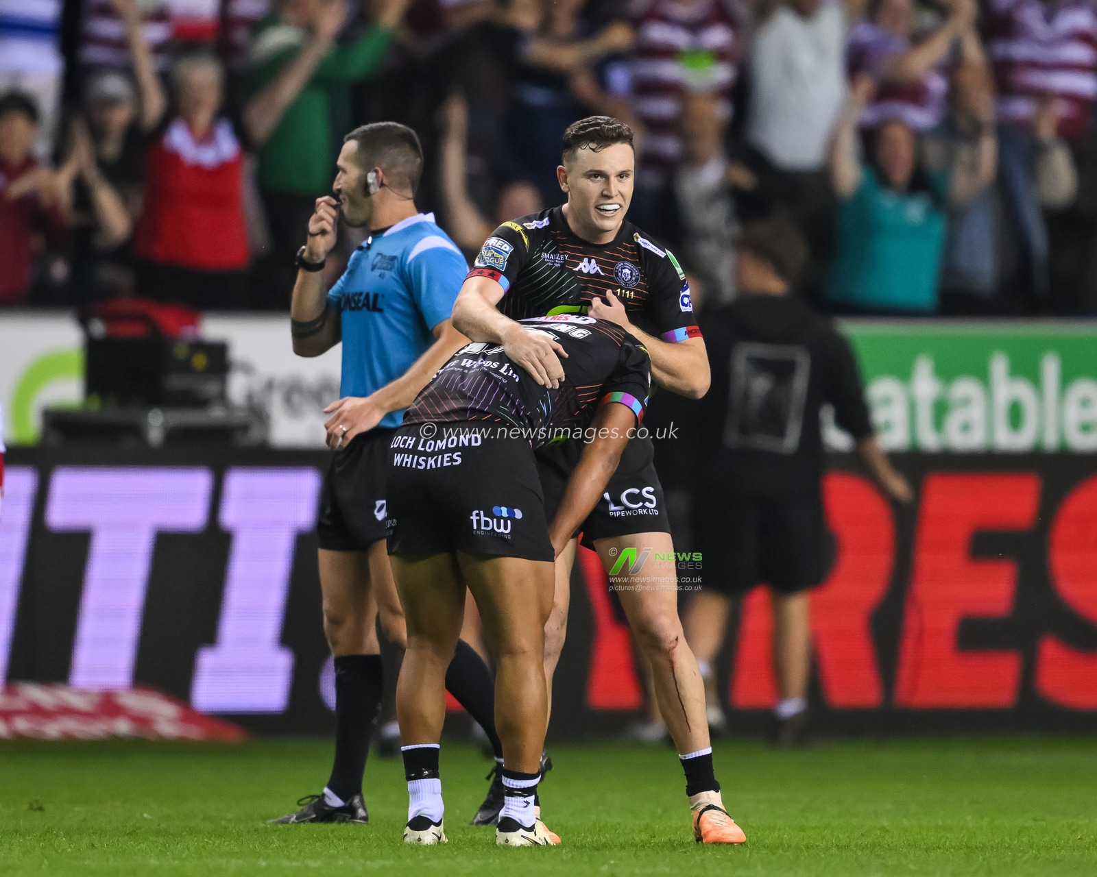 Jai Field of Wigan Warriors celebrates winning the Betfred Super League Round 25 match Wigan Warriors vs Hull KR at The Brick Community Stadium, Wigan, United Kingdom, 6th September 2024

(Photo by Craig Thomas/News Images)