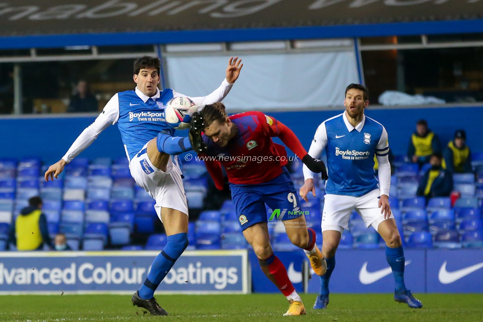 Sam Gallagher #9 of Blackburn Rovers is fouled by Mikel San Jose #19 of Birmingham City