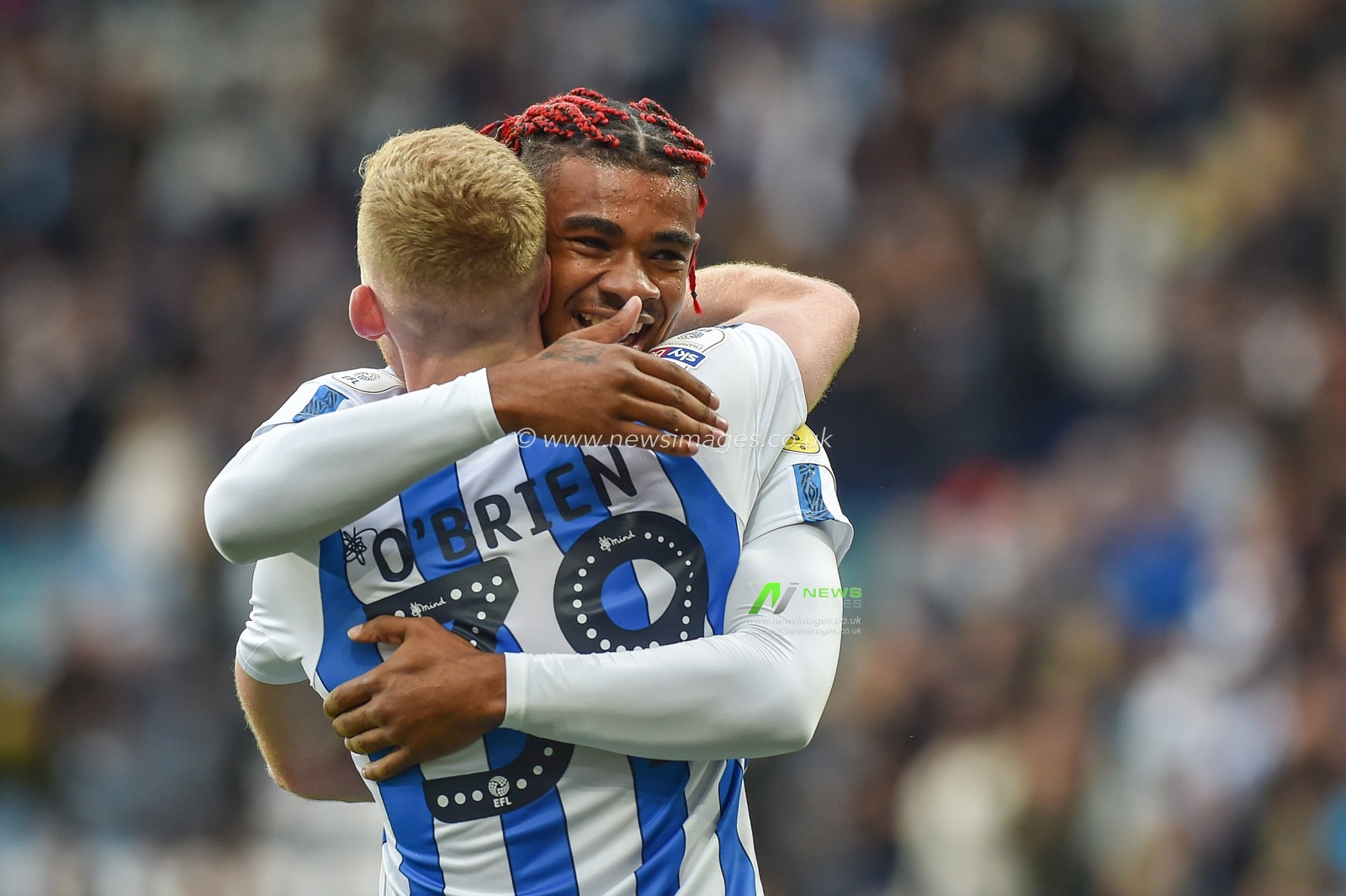 5th October 2019, John Smith's Stadium, Huddersfield, England; Sky Bet Championship, Huddersfield Town v Hull City :Juninho Bacuna (7) and Lewis O'Brien (39) of Huddersfield Town celebrate Huddersfield Townâ€™s third goal to make it 3-0. 
Credit: Dean Williams/News Images