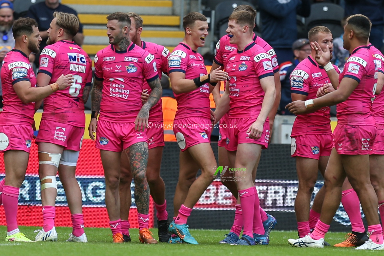 Ash Handley #5 of Leeds Rhinos celebrates his 5th try of the match to make it 16-60