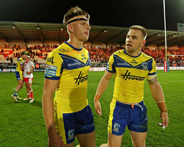 Ewan Irwin of Warrington Wolves and Matt Dufty of Warrington Wolves after the Betfred Super League round 27 match Hull KR vs Warrington Wolves at Sewell Group Craven Park, Kingston upon Hull, United Kingdom, 18th September 2025(Photo by Sam Eaden/News Images)