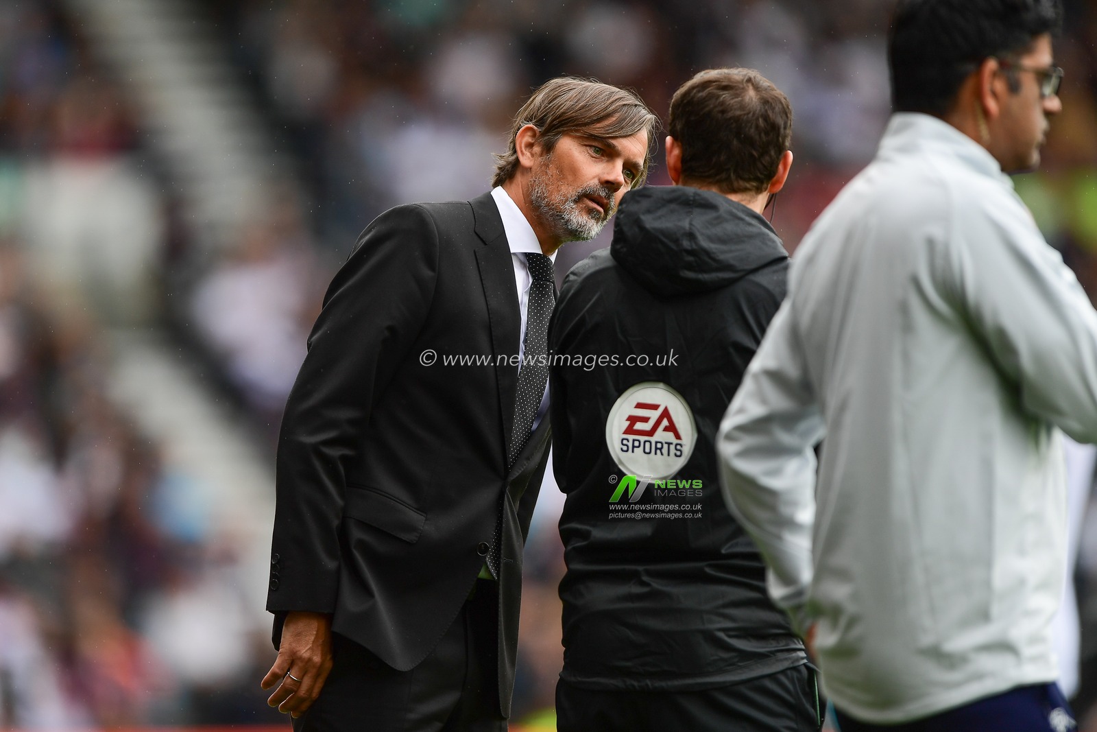 10th August 2019, Pride Park, Derby, England; Sky Bet Championship, Derby County vs Swansea City ; Phillip Cocu, Manager of Derby County talks to the 4th official

Credit: Jon Hobley/News Images 

English Football League images are subject to DataCo Licence