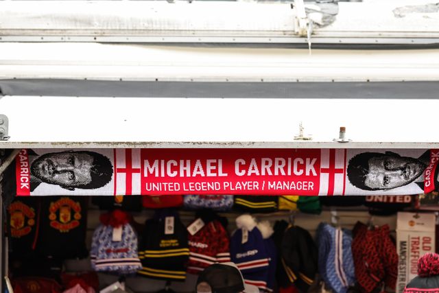 A Michael Carrick manager of Manchester United scarf on sale during the Premier League match Manchester United vs Fulham at Old Trafford, Manchester, United Kingdom, 1st February 2026

(Photo by Mark Cosgrove/News Images)