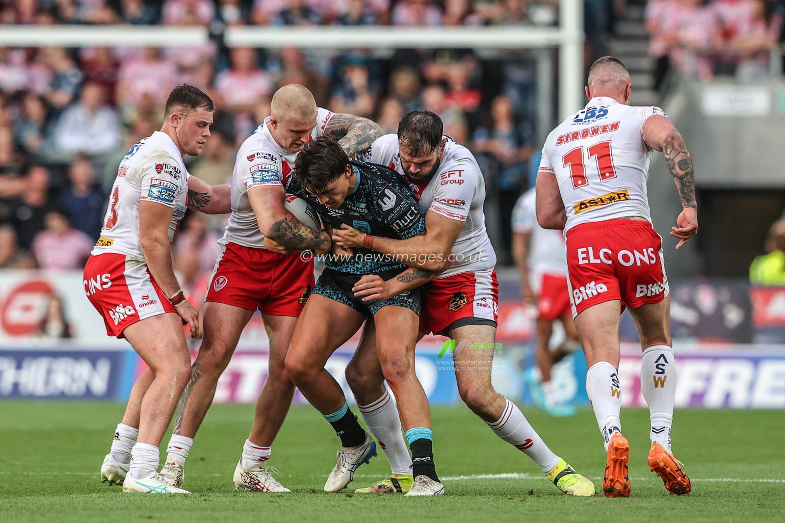 Owen Trout of Leigh Leopards is tackled during the Betfred Super League round 19 match St Helens vs Leigh Leopards at Totally Wicked Stadium, St Helens, United Kingdom, 17th July 2025

(Photo by Alfie Cosgrove/News Images)