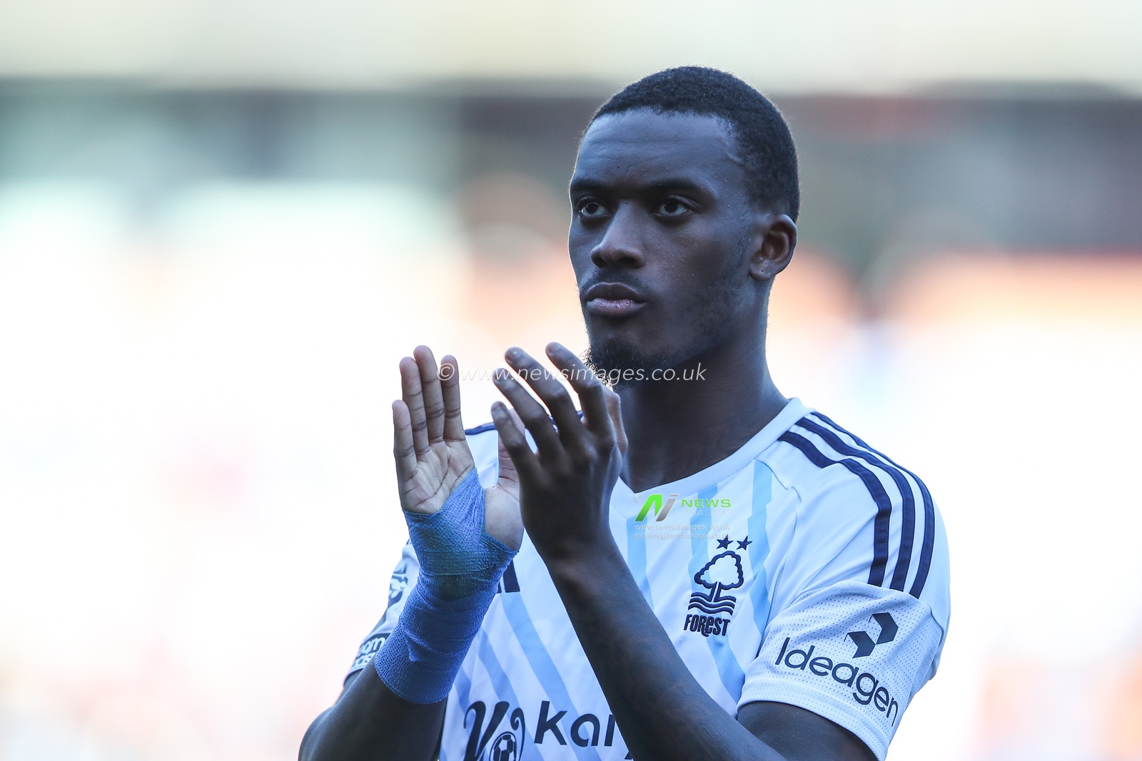 Callum Hudson-Odoi of Nottingham Forest applauds the travelling fans after the Premier League match Burnley vs Nottingham Forest at Turf Moor, Burnley, United Kingdom, 19th May 2024

(Photo by Gareth Evans/News Images)