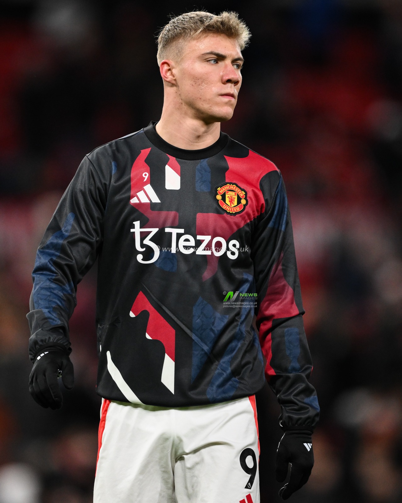 Rasmus HÃ¸jlund of Manchester United during the pre-game warm up ahead of the Premier League match Manchester United vs Newcastle United at Old Trafford, Manchester, United Kingdom, 30th December 2024

(Photo by Craig Thomas/News Images)