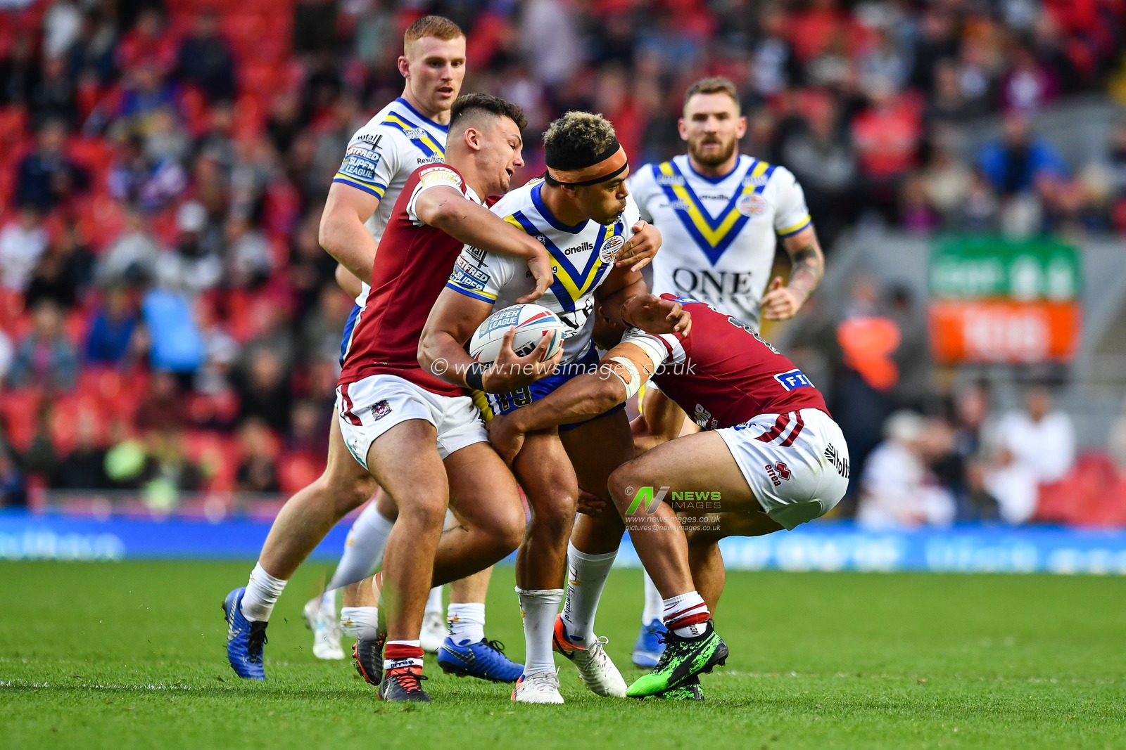 25th May 2019 , Anfield Stadium, Liverpool, England; Dacia Magic Weekend, Betfred Super League Round 16, Wigan Warriors vs Warrington Wolves ; Sitaleki Akauola (19) of Warrington Wolves in action 

Credit: Craig Thomas/News Images