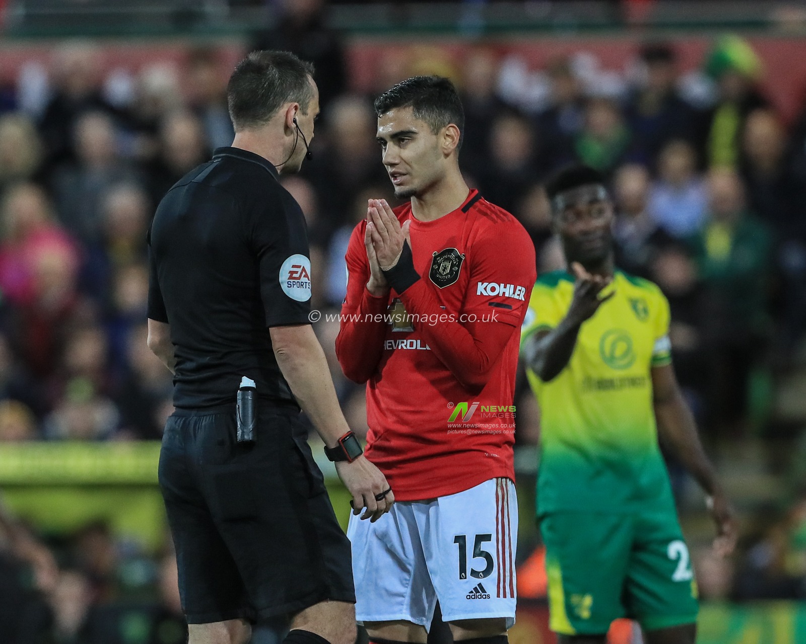 27th October 2019, Carrow Road, Norwich, England; Premier League, Norwich City v Manchester United : referee Stuart Attwell has words with Andreas Pereira (15) of Manchester United 

Credit: Mark Cosgrove/News Images