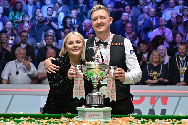 Kyren Wilson celebrates the Cazoo World Championships victory with his wife following the Cazoo World Championships 2024 Final at Crucible Theatre, Sheffield, United Kingdom, 6th May 2024

(Photo by Cody Froggatt/News Images)