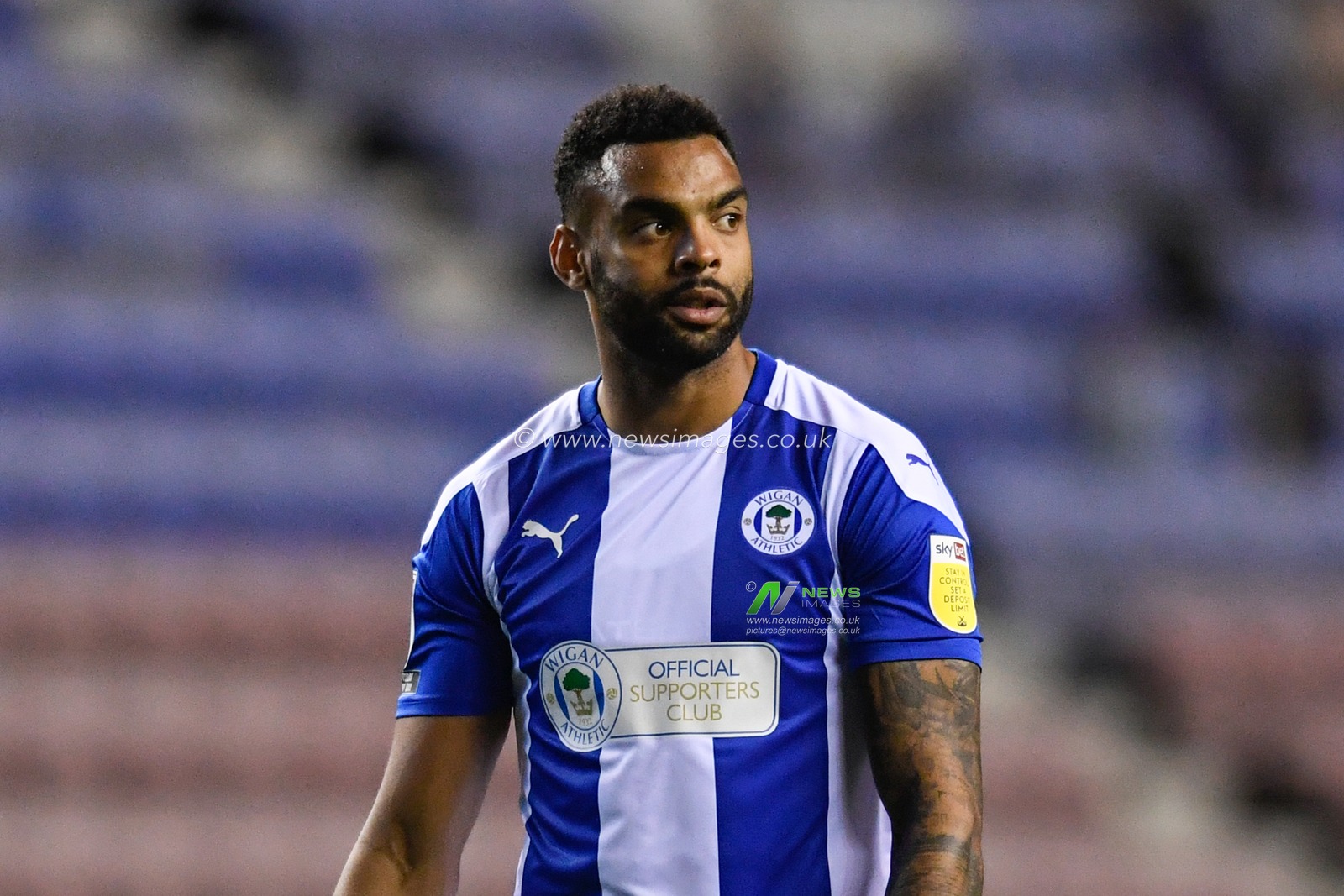 Curtis Tilt (4) of Wigan Athletic in action during the game