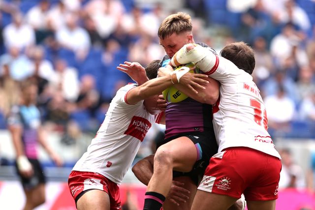 Amir Bourouh of Hull FC is tackled by Jai Whitbread of Hull KR during the Betfred Super League Magic Weekend match Hull KR vs Hull FC at Hill Dickinson Stadium, Liverpool, United Kingdom on 04 July 2026

(Photo by Alfie Cosgrove/News Images)