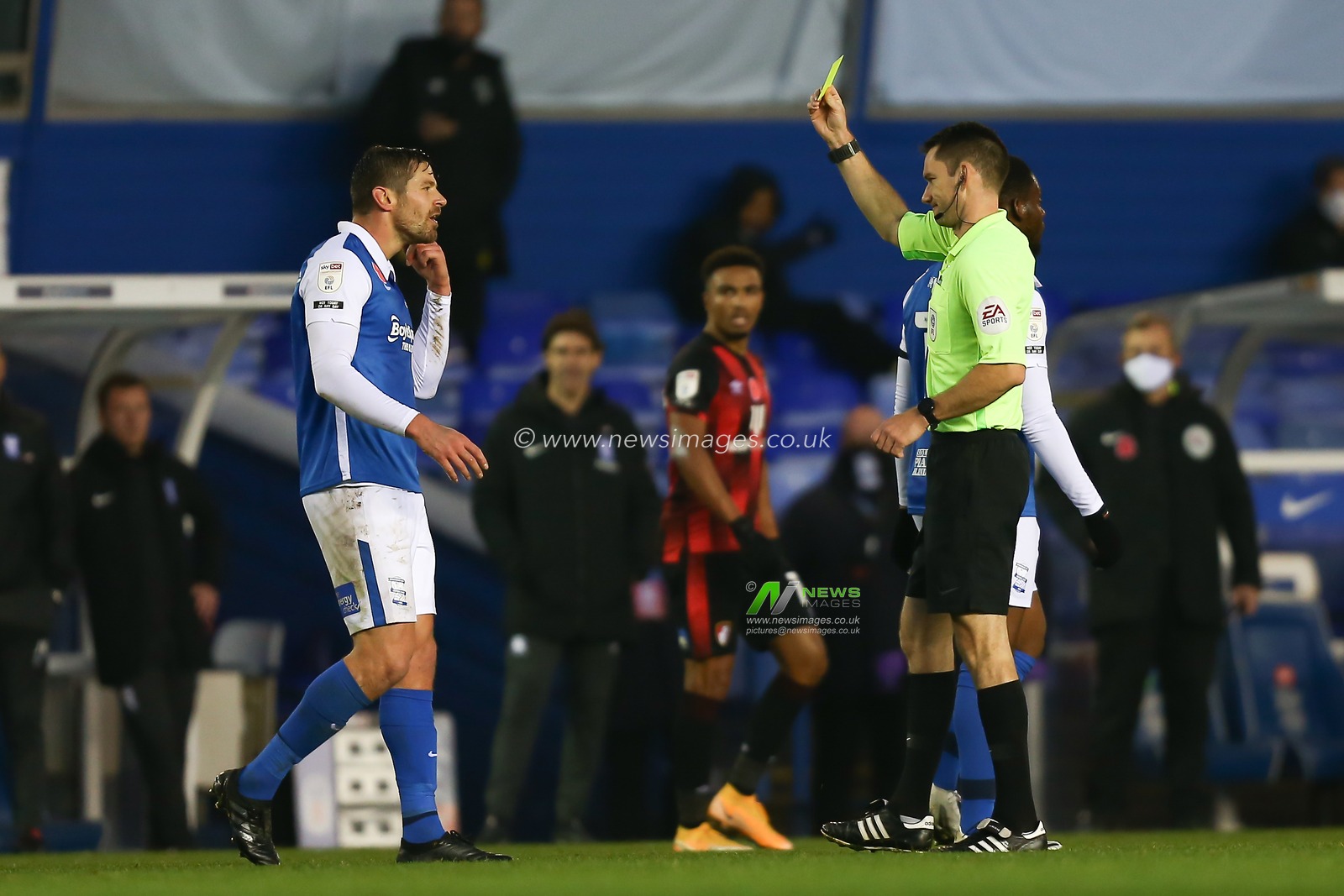 Lukas Jutkiewicz #10 of Birmingham City is shown a yellow card