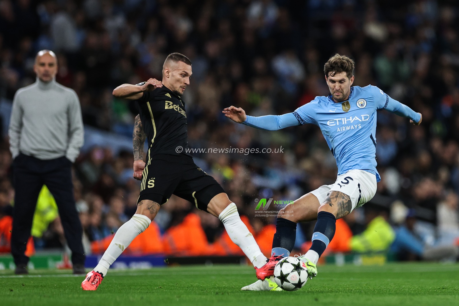 LukÃ¡Å¡ HaraslÃ­n of Sparta Prague and John Stones of Manchester City battle for the ball during the UEFA Champions League, League Stage Manchester City v Sparta Prague at Etihad Stadium, Manchester, United Kingdom, 23rd October 2024

(Photo by Mark Cosgrove/News Images)