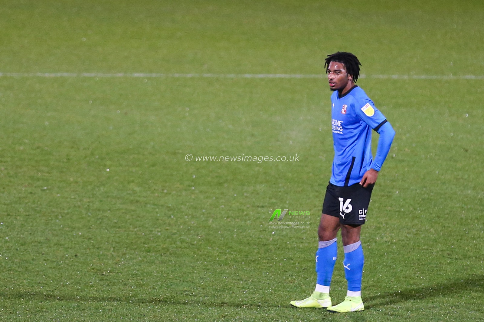 Akinwale Odimayo #16 of Swindon Town reacts during the game