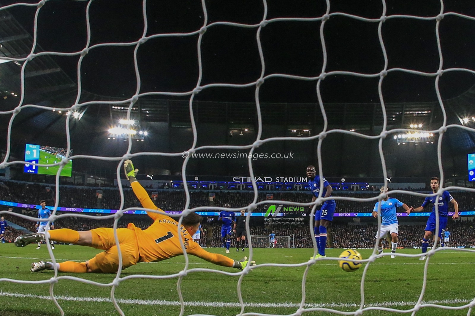 23rd November 2019, Etihad Stadium, Manchester, England; Premier League, Manchester City v Chelsea : Riyad Mahrez (26) of Manchester City scores to make it 2-1

Credit: Mark Cosgrove/News Images