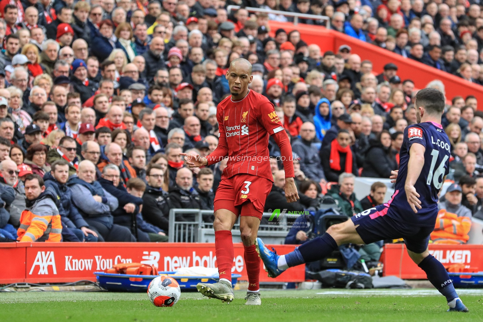 7th March 2020, Anfield, Liverpool, England; Premier League, Liverpool v Bournemouth : Fabinho (3) of Liverpool passes the Balla asLewis Cook of Bournemouth pressures