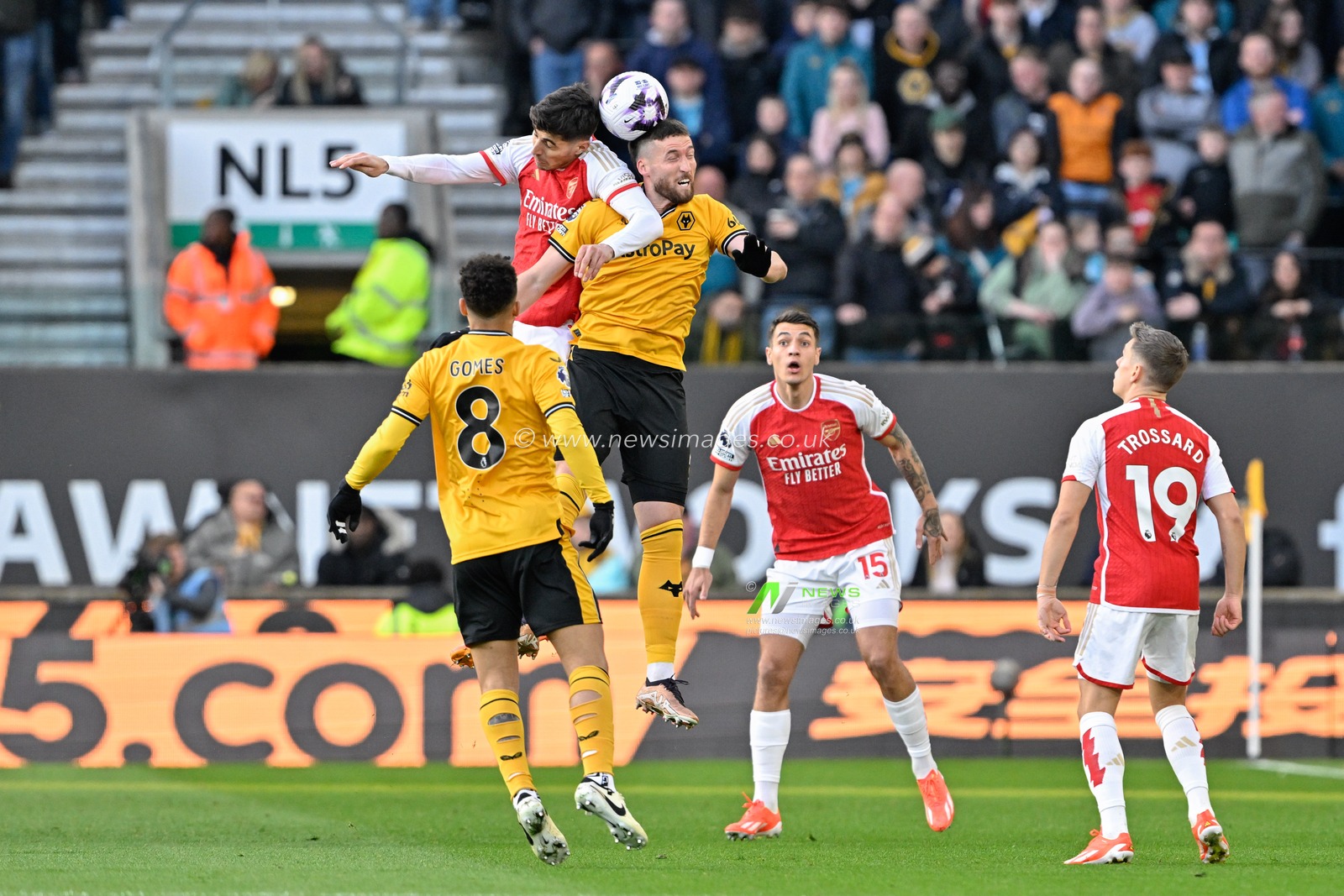 Matt Doherty of Wolverhampton Wanderers and Kai Havertz of Arsenal battle for the ball, during the Premier League match Wolverhampton Wanderers vs Arsenal at Molineux, Wolverhampton, United Kingdom, 20th April 2024

(Photo by Cody Froggatt/News Images)