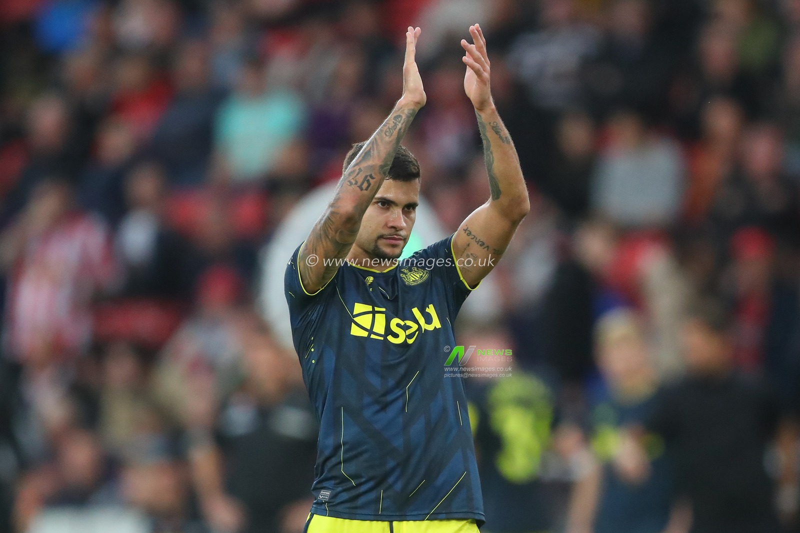 Bruno GuimarÃ£es #39 of Newcastle United applauds the travelling fans after during the Premier League match Sheffield United vs Newcastle United at Bramall Lane, Sheffield, United Kingdom, 24th September 2023

(Photo by Gareth Evans/News Images)