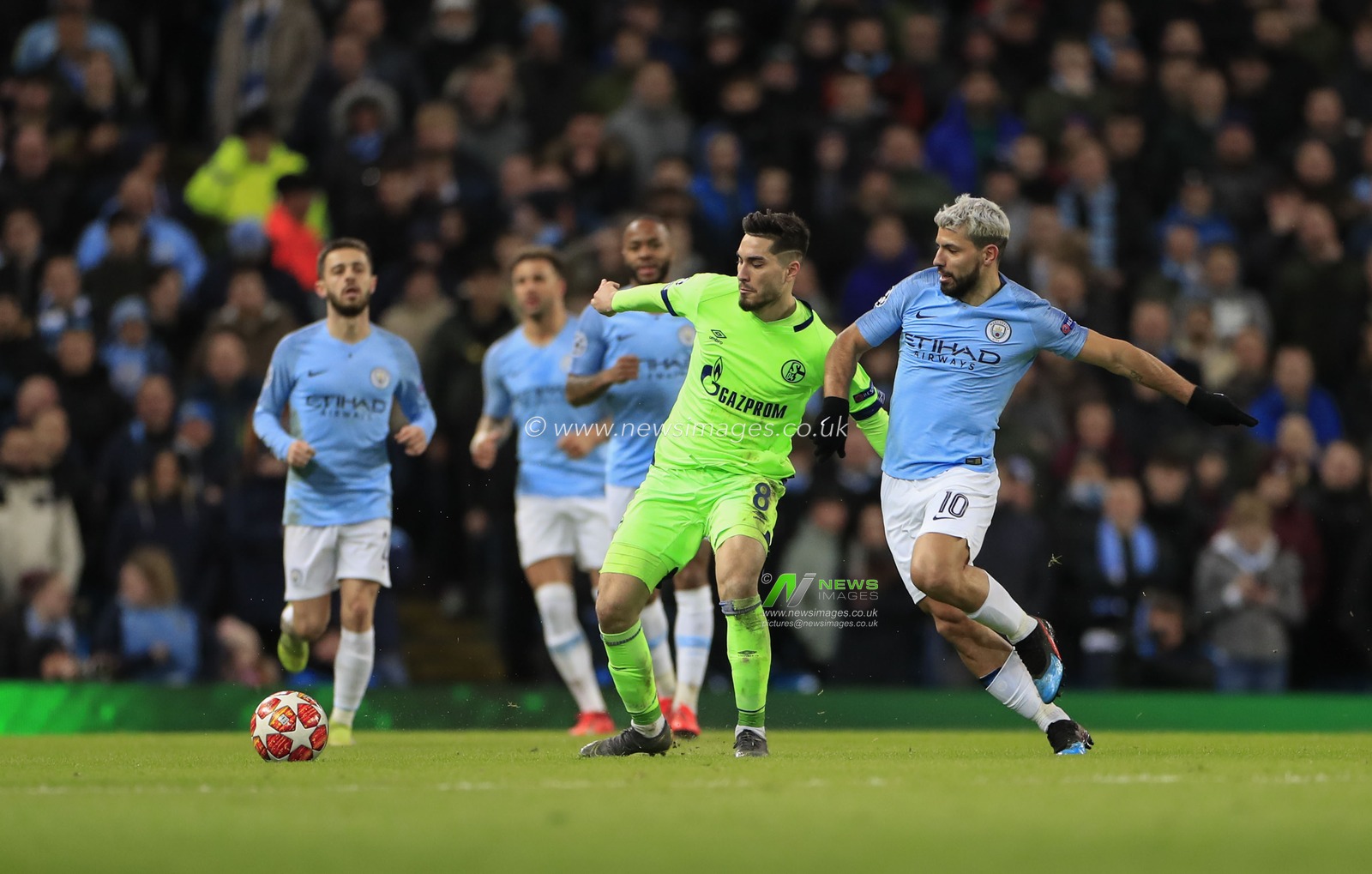 ,12th March 2019 , Etihad Stadium, Manchester, England; UEFA Champions League, Round of 16, Manchester City v Schalke ; Sergio Aguero (10) of Manchester City and Suat Serdar (08) of FC Schalke challenge for the ball


Credit: Conor Molloy/News Images