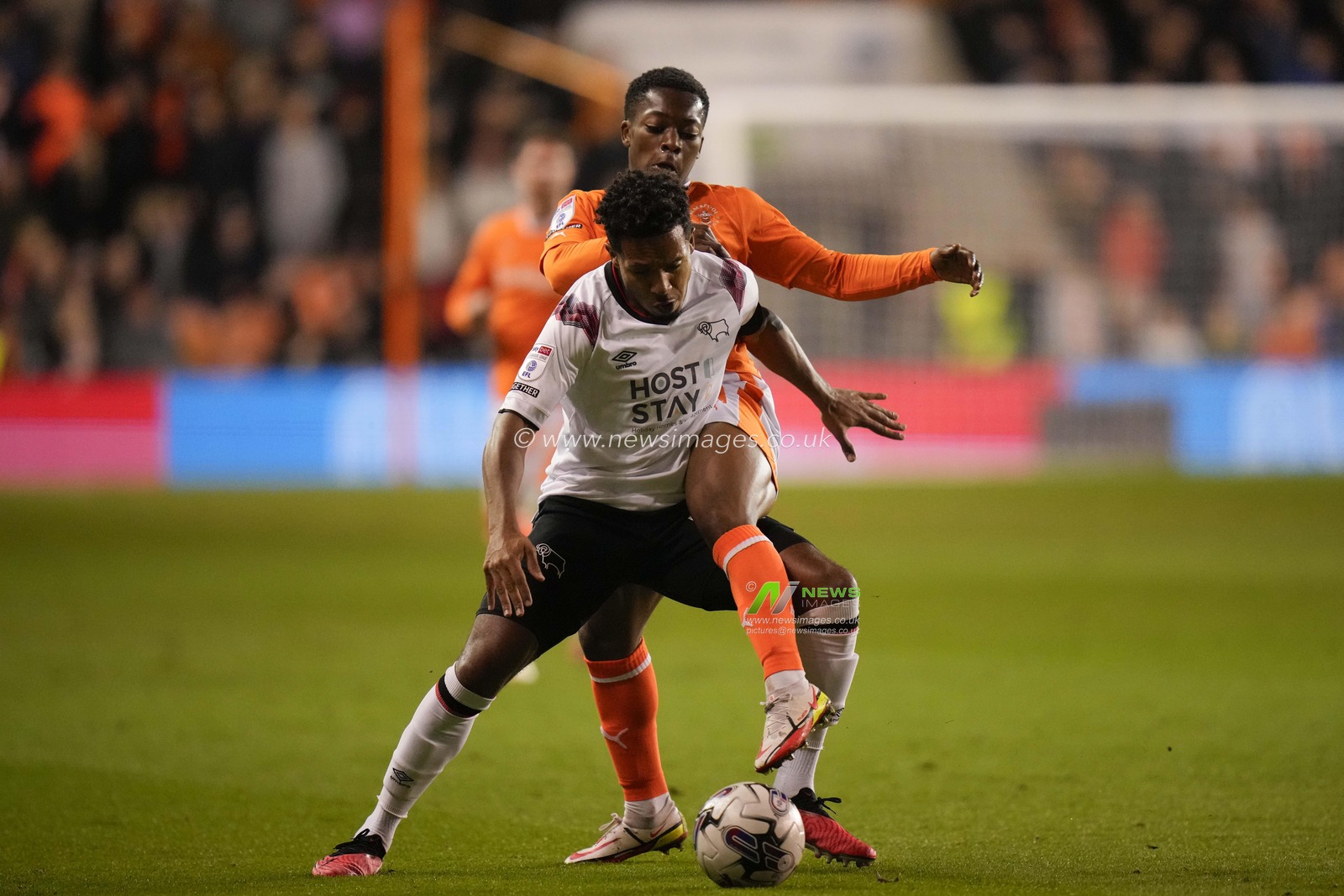 Karamoko Dembele #11 of Blackpool competes for the ball with Korey Smith #12 of Derby County during the Sky Bet League 1 match Blackpool vs Derby County at Bloomfield Road, Blackpool, United Kingdom, 3rd October 2023

(Photo by Steve Flynn/News Images)