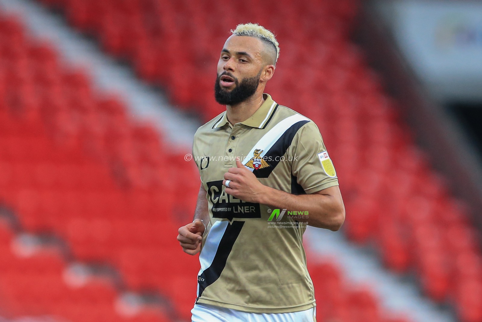 John Bostock #15 of Doncaster Rovers during the game