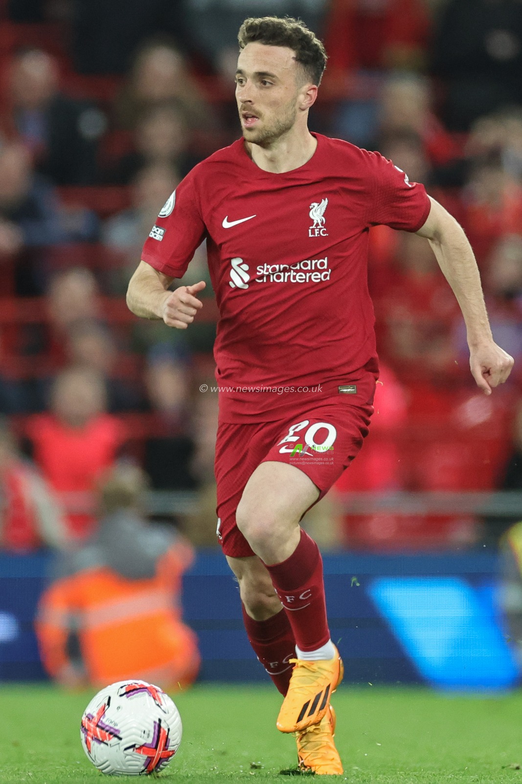 Diogo Jota #20 of Liverpool breaks with the ball during the Premier League match Liverpool vs Fulham at Anfield, Liverpool, United Kingdom, 3rd May 2023

(Photo by Mark Cosgrove/News Images)