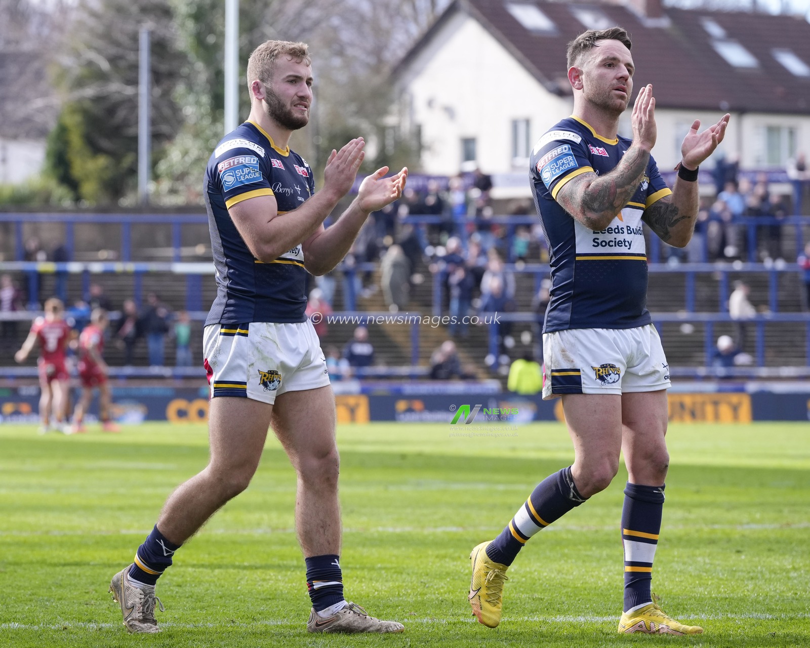 Jarrod Oâ€™Connor #14 of Leeds Rhinos and Richie Myler #1 of Leeds Rhinos salute the fans after the Betfred Super League Round 6 match Leeds Rhinos vs Catalans Dragons at Headingley Stadium, Leeds, United Kingdom, 25th March 2023

(Photo by Steve Flynn/News Images)